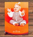 Baby Guess Smiling Baby in Fleece Outfit on Orange Chair Print Ad 1997 1990s