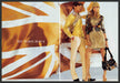 Burberry 2000s Print Advertisement (2 page) 2006 Couple Legs Mustard Yellow Burberry
