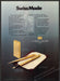 Caran d'Ache Lighter and Pen 1980s Print Advertisement Ad 1982 Fetch the Paper!