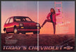 Chevrolet Sprint 1980s Print Advertisement (2 page) 1986 Woman Corporate Ladder Fetch-the-Paper