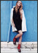 Franco Sarto Shoes 2010s Print Advertisement 2012 Model Posing Against Blue Wall Fetch-the-Paper