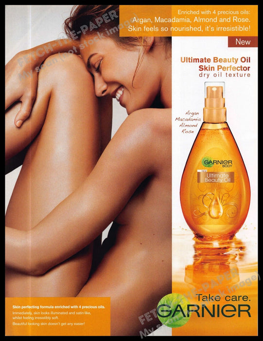 Garnier 2010s Magazine Print Advertisement 2013 Beauty Oil Girl Skin Bare Body