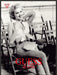 Guess Jeans Eva Herzigova 1990s Print Advertisement 1992 Deck Chairs Reading Fetch-the-Paper