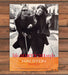 Halston Lifestyle Two Women Laughing Black Coats Print Ad 1997 1990s