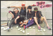Juicy Couture 2000s Print Advertisement (2 page) 2007 Friends Leaning Tennis Net Fetch-the-Paper