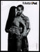 Meltin' Pot Clothing 2000s Print Advertisement 2005 Embracing Couple Fetch-the-Paper
