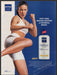 Nivea Q10 2000s Print Advertisement 2003 Lotion Body Kickboxing Woman Fetch-the-Paper