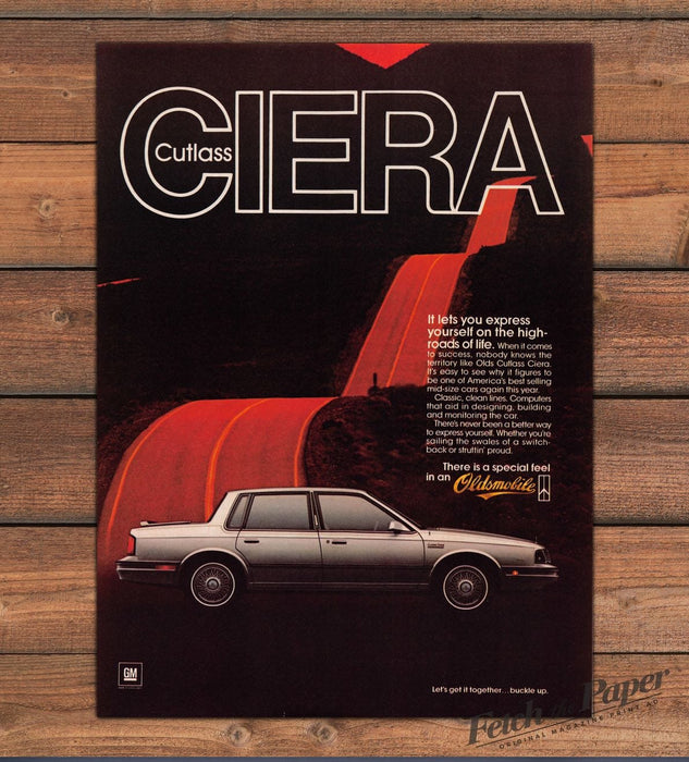 Oldsmobile Cutlass Ciera Silver Sedan Red Road Wire Wheels Print Ad 1985 1980s