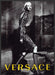 Versace Fashion 2010s Print Advertisement 2012 Model Legs Grayscale Fetch-the-Paper