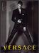 Versace Men's 2010s Print Advertisement 2012 Model Wide Stance Grayscale Fetch-the-Paper