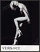 Versace Shoes January Jones 2010s Print Advertisement 2011 Legs Bare Body Fetch-the-Paper