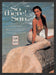 1996 Print Advertisement Bain de Soleil Sunblock Mermaid Model on Rock Ad.