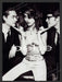 bebe 2000s Print Advertisement 2002 Olga Kurylenko Two Men Fetch the Paper!