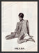 Prada 1990s Print Advertisement 1995 Pajamas Sitting Model Clothing Promo Fetch the Paper!