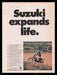 Suzuki Motorcycle 1970s Print Advertisement Ad 1972 Vintage "Expands Life" Fetch the Paper!