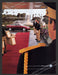 2001 VW Volkswagen Passat Bell-hop Red Carpet Print Advertisement.